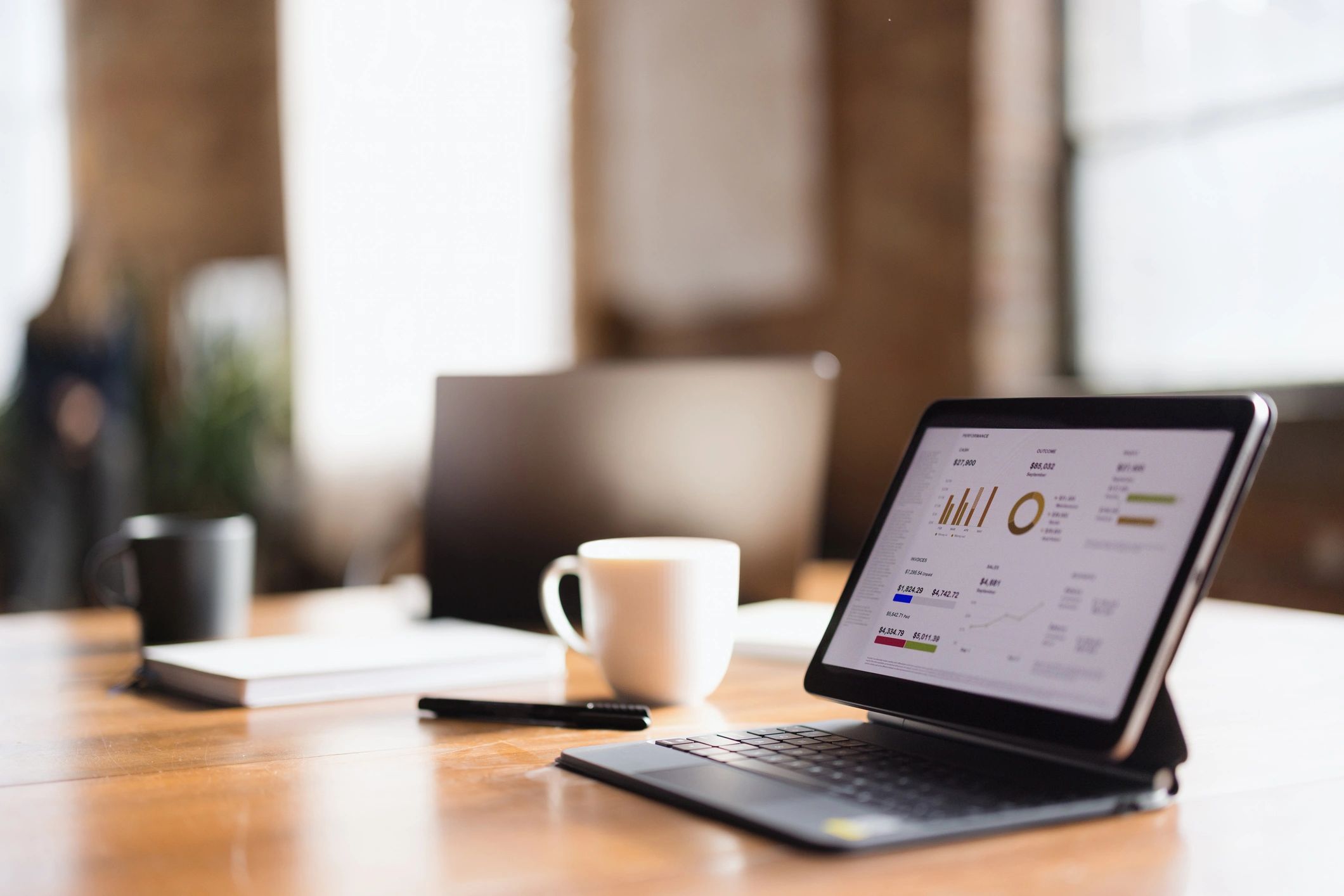 Business laptop showing cloud software dashboard