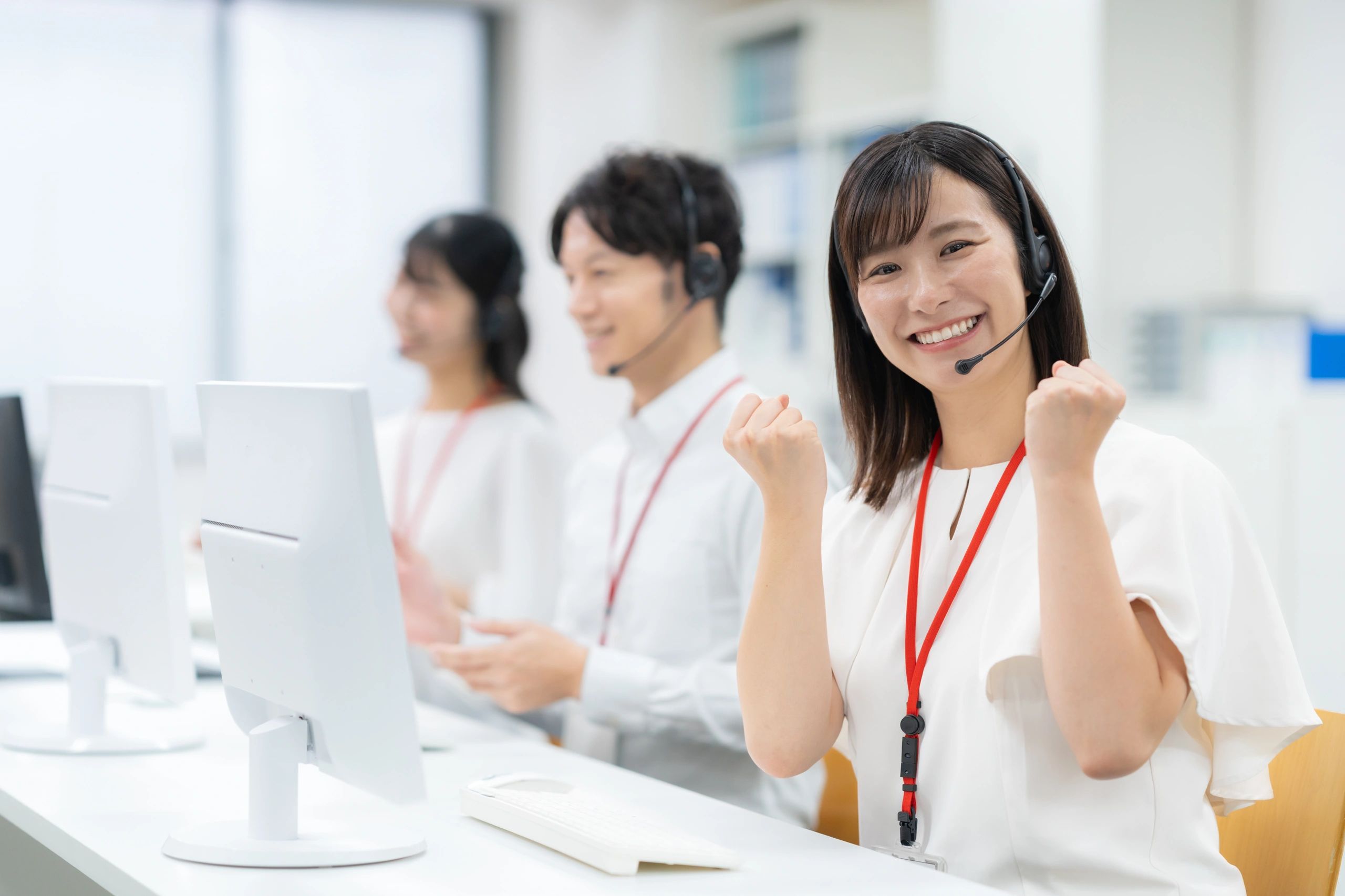 Help desk support team assisting customers