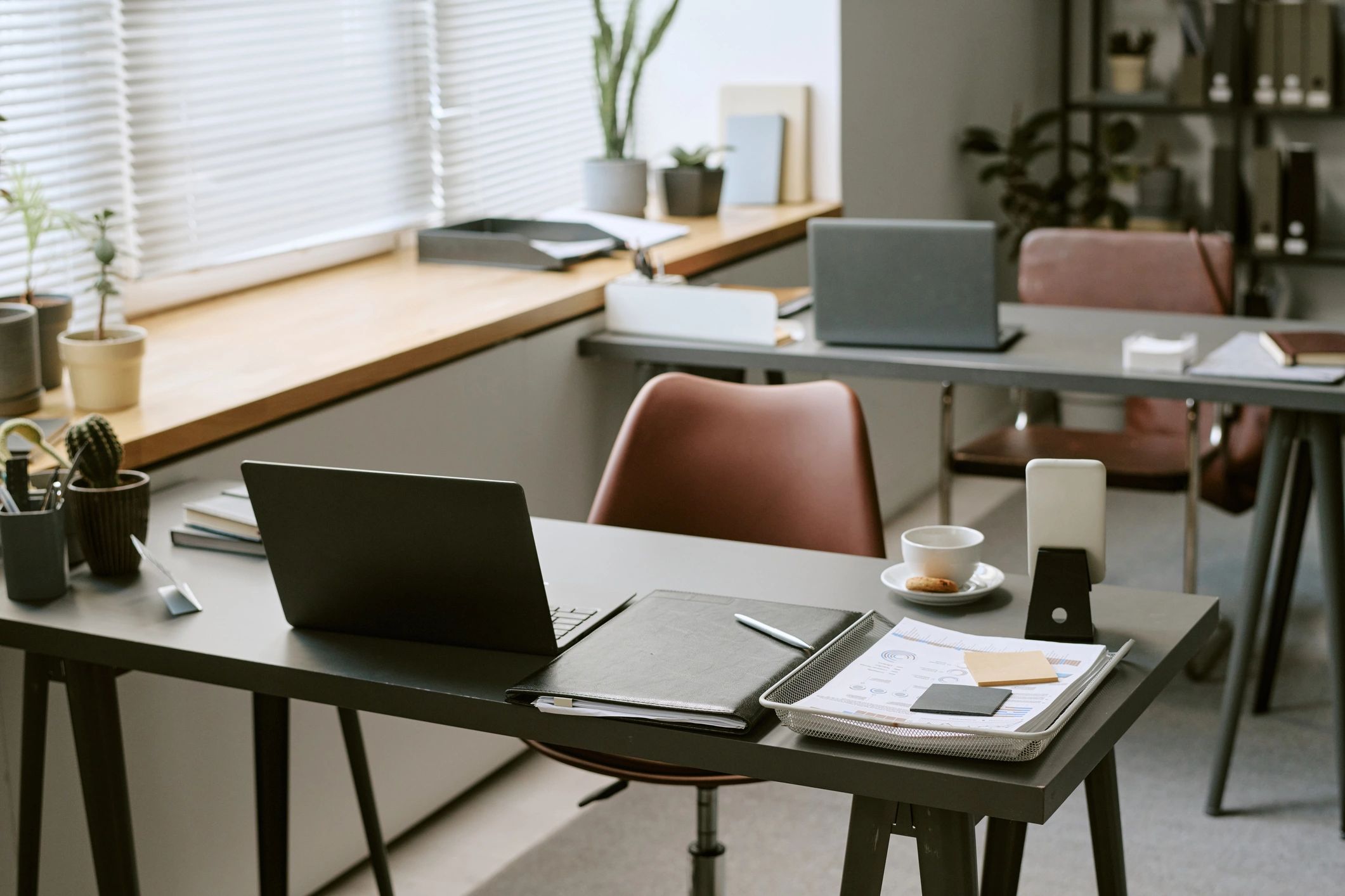 Modern office workspace representing managed device security and patching